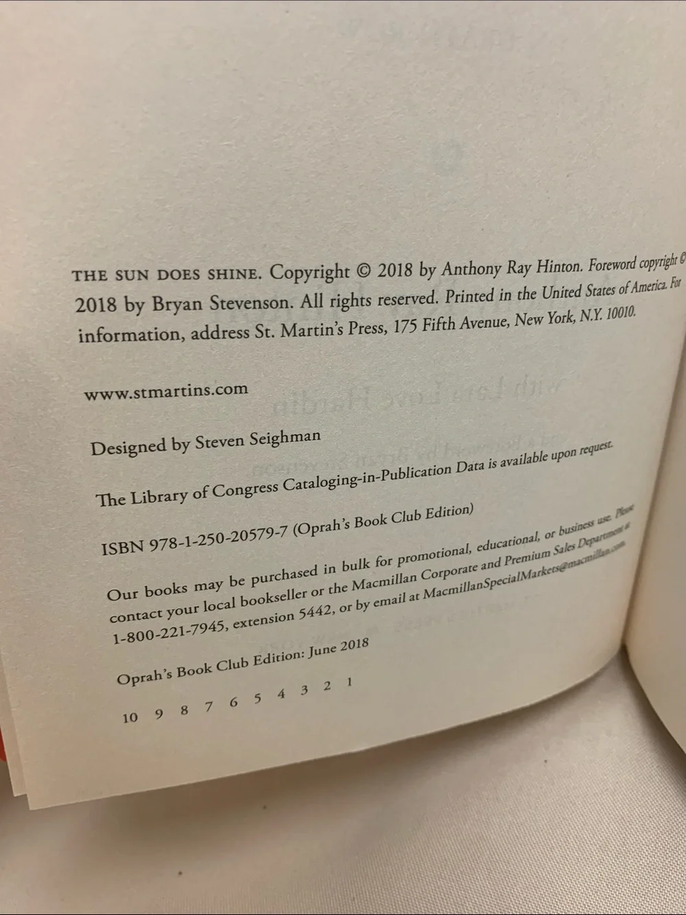 The Sun Does Shine by Anthony Ray Hinton — Orange Hardcover Book